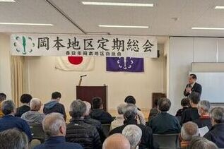 写真:岡本地区自治会総会での市長あいさつの様子